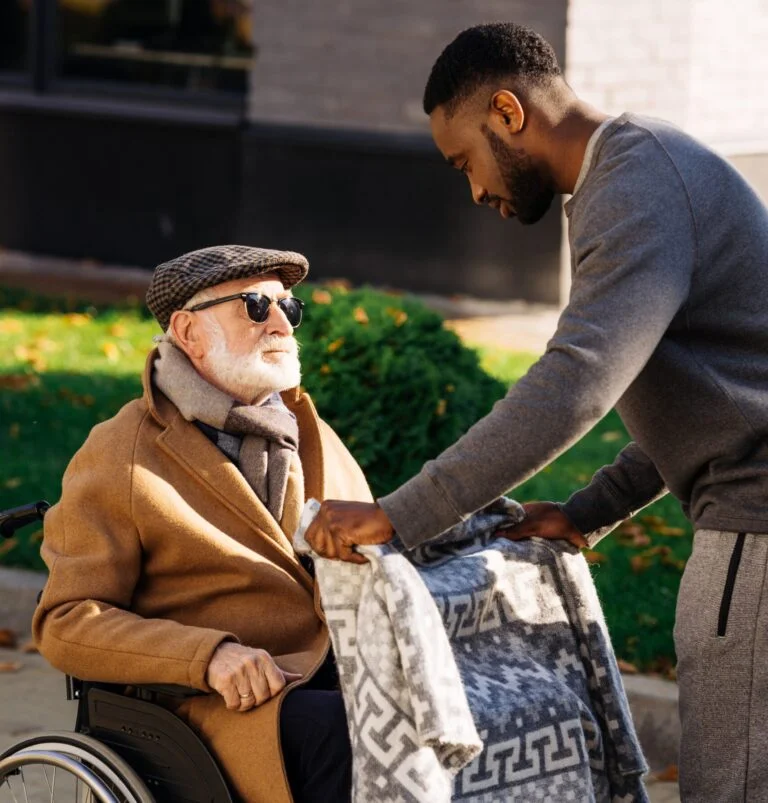 African american man covering senior disabled man 006 FfOW
